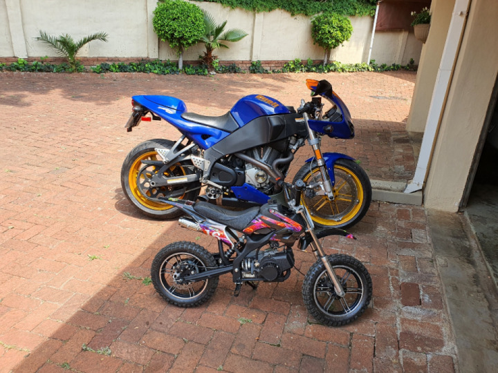 My 6 year old son parking his bike proudly next to daddy's....