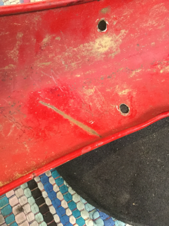 No dent in the fender: