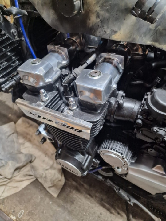 Swing arm refitted and new spark plugs fitted