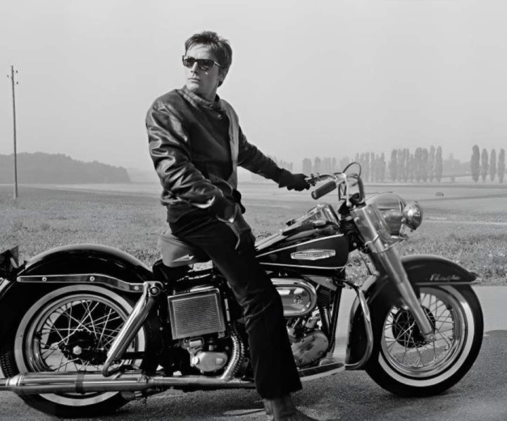 Legendary French actor Alain Delon on a 1966 Harley Davidson FLH Electra Glide Motorcycle