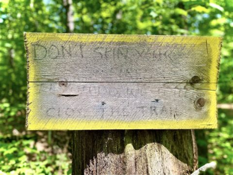 Sign says - “Don’t spin your tires.