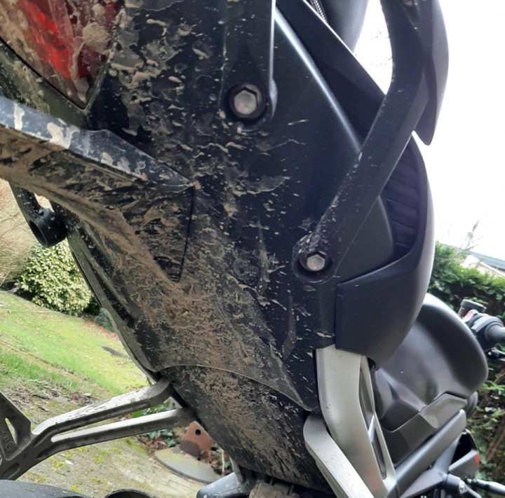 Oops, wrong turn into a muddy road with my street bike and slicks...
