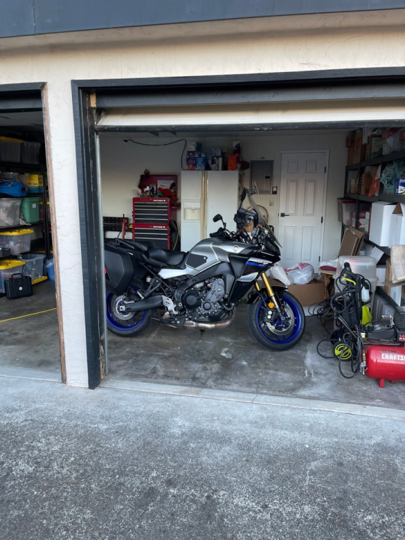 Trying to decide how to store my motorcycle in our new downsized garage!