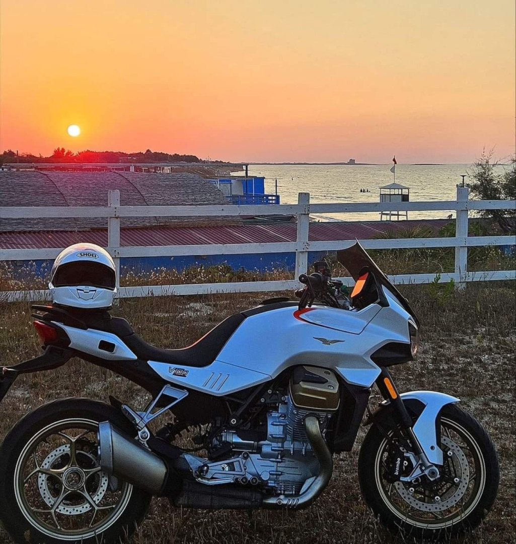 Riding a Guzzi along the coast road at sunset is priceless... Emotions!