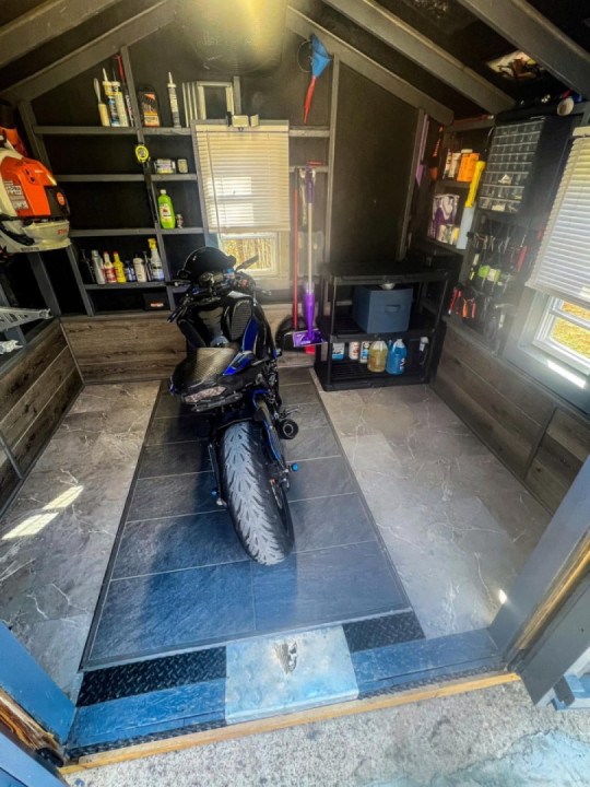 Decided to replace the cheap, stuck-down tiles around the edges with hardwood.