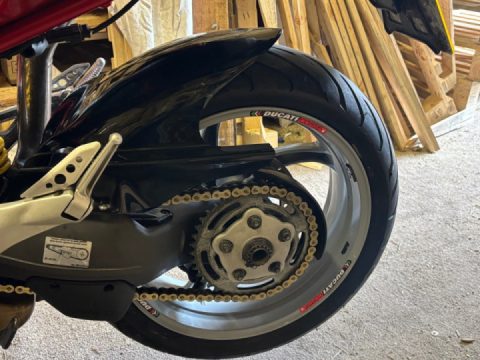 Rear hugger fitted, fiddly , but on and solid, cleans it up a bit