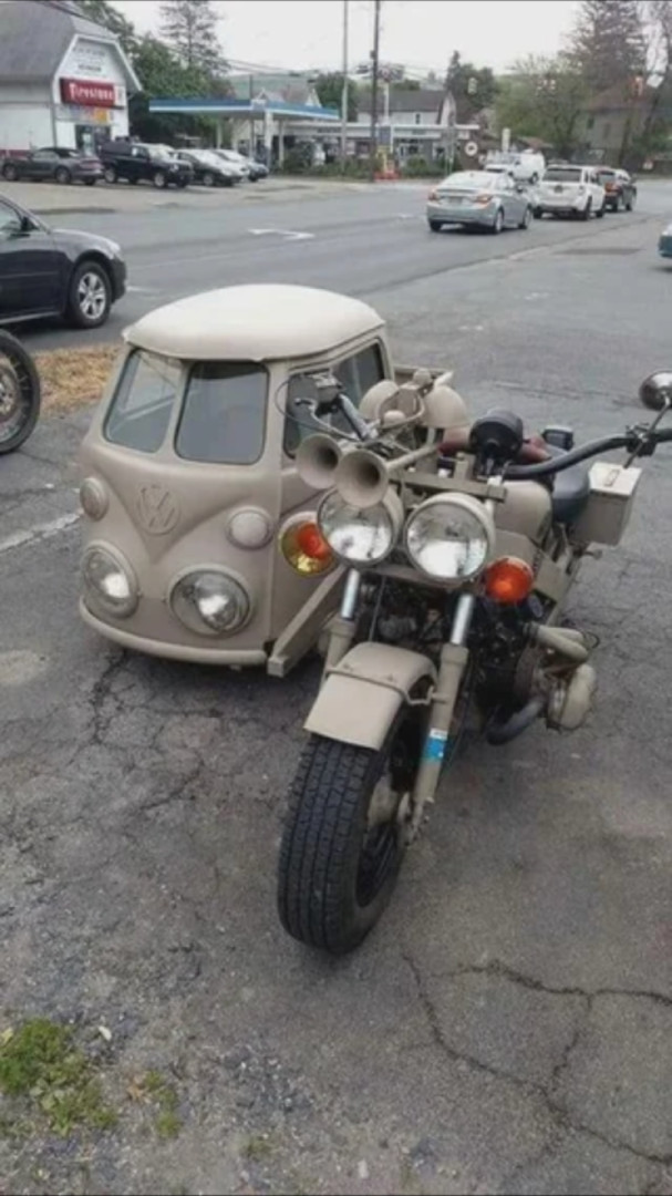 Saw this cool motorcycle and sidecar