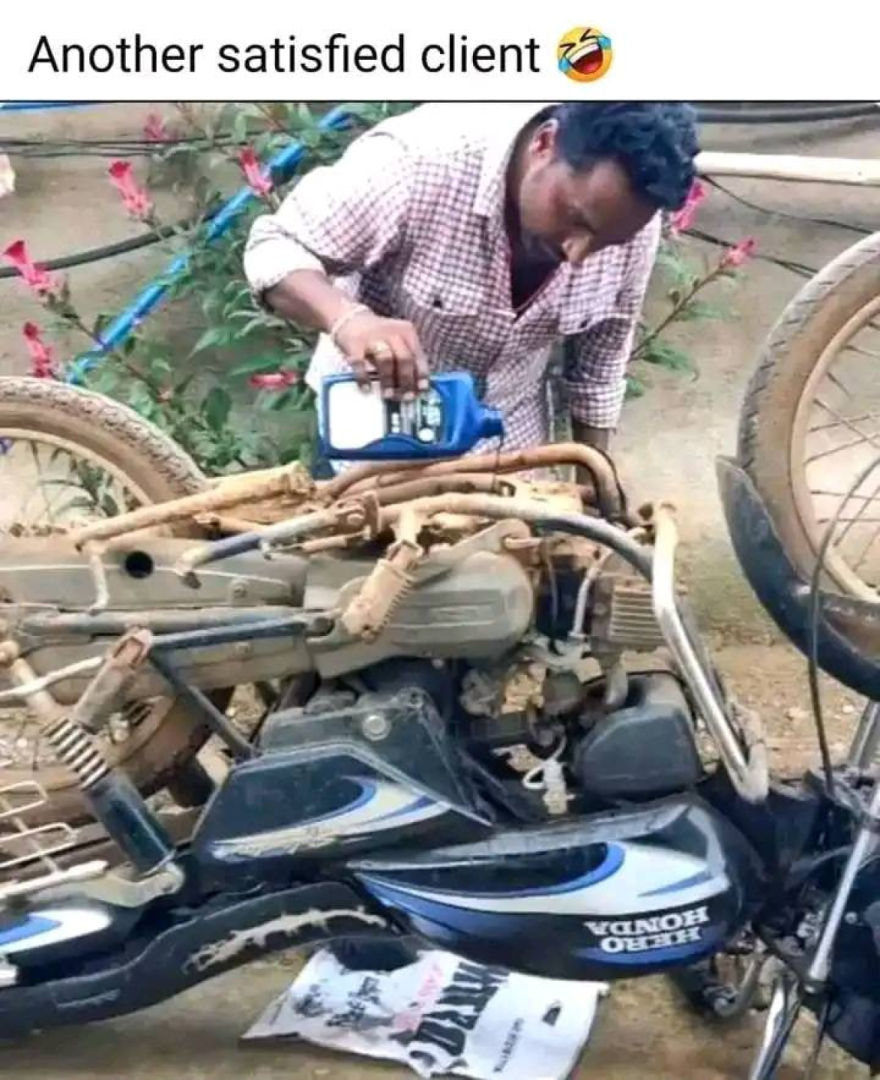 When you can't find the oil cap, just turn the whole bike upside down—problem solved!