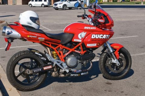 I told Chat GPT to put sportbike racing decals on my Ducati. What do you think?