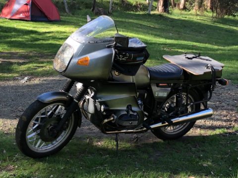 Modified ass end, RS solo seat and a bing bowl coffee table, on top of good storage space.