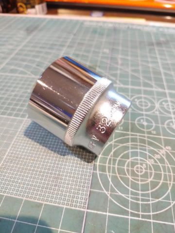 I got a 32mm socket specifically for the axle