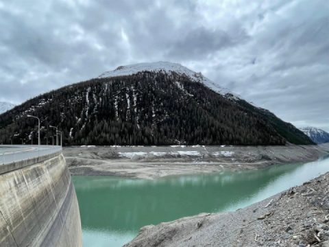 "There's a tunnel...that opens onto a dam containing a long,