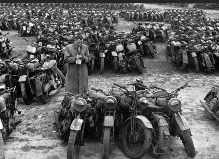 Military motorbikes being sold in bundles of 5 for scrap,England 1946