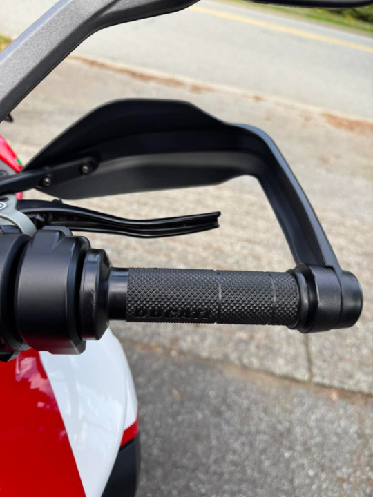 Backing out of a parking spot and waving to a kid in the car next to me