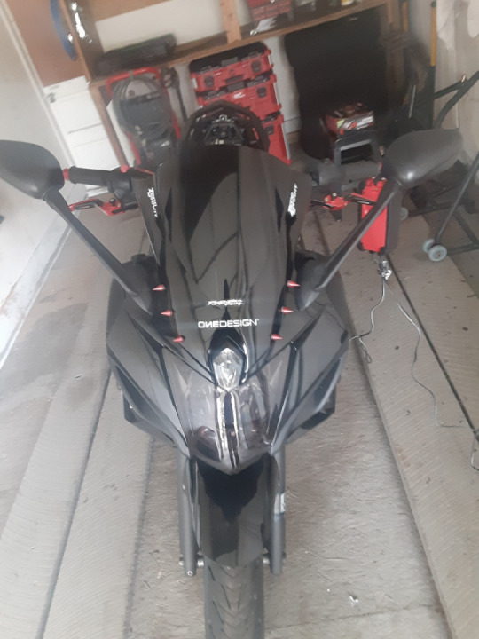 Tinted black headlight cover fz6r