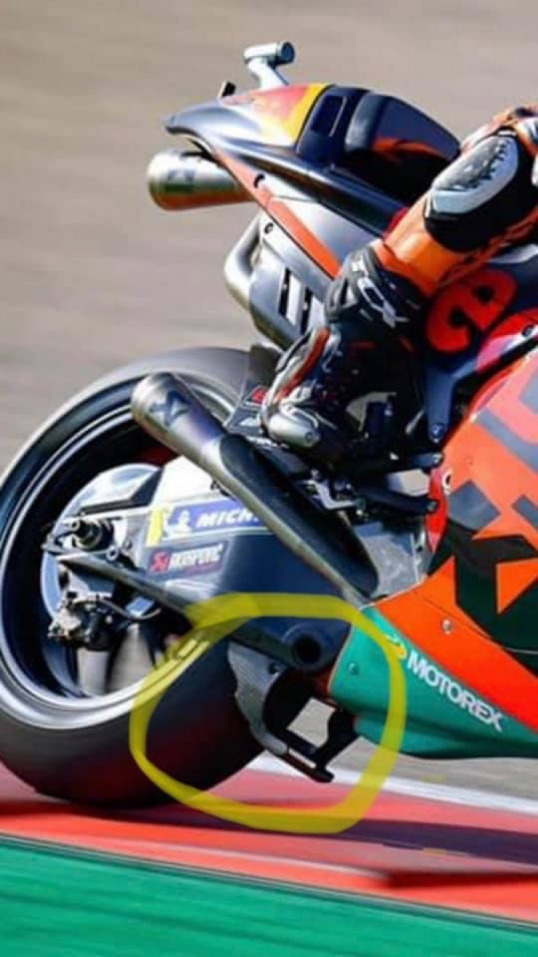 Anyone know what the “scoop” does under the KTM swing arm?