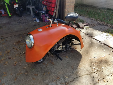 A Little sumpin'. Nice little toy. Made with the "fender" and the mini bike frame from scratch.