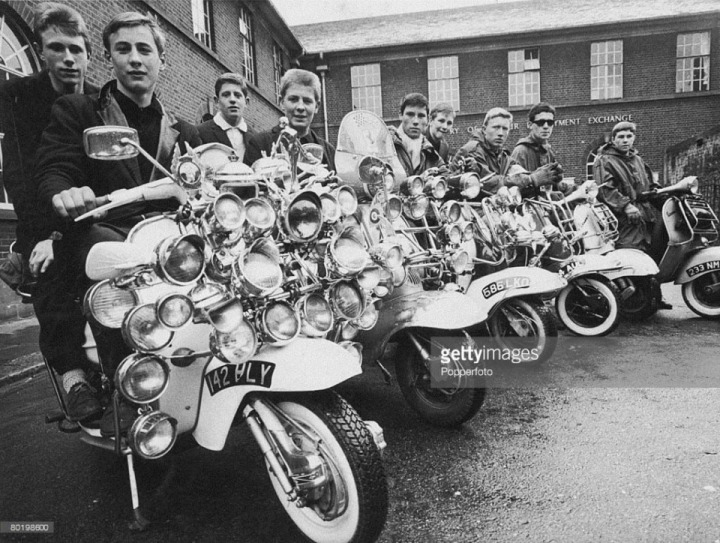 A group of mods with their decorated scooters
