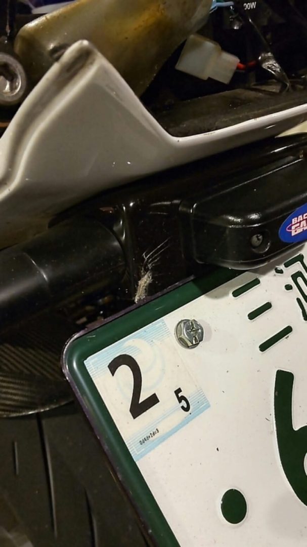 I was driving yesterday and I thought the license plate was kind of loose, but it was cracked