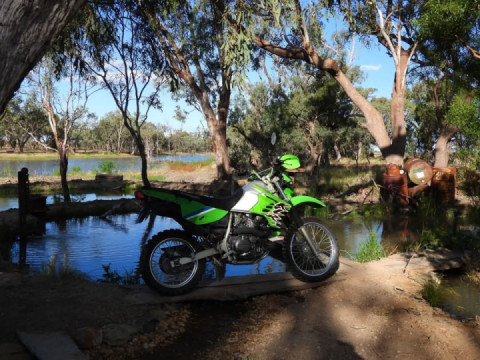 Put the original tank and shrouds back on the KLR