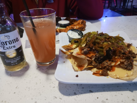 Corona SunRise & Brisket Nachos wid jalapeños