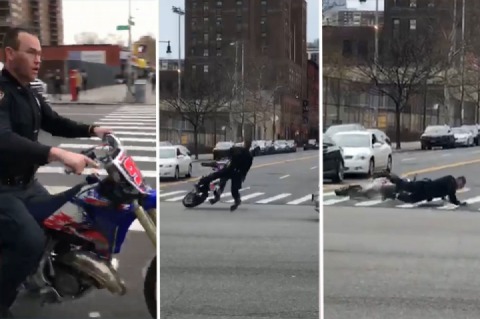 NYPD officer wipes out on dirt bike in Harlem