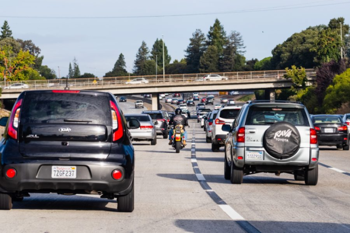 Commuting by motorcycle makes a lot more sense if you're able to lanesplit, like this California rider. Photo: Sundry Photography/Shutterstock.com