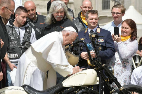 The Pope’s Harley is being auctioned off
