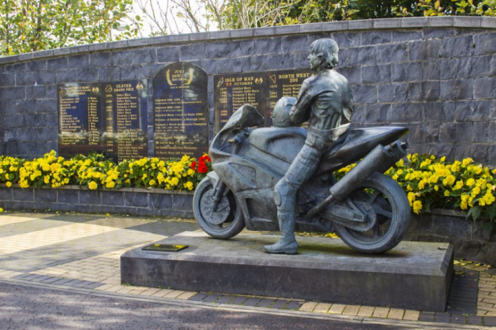 The memorial garden for Joey Dunlop in Ballymoney, County Antrim, Northern Ireland. A long history of motorcycle racing in this region was about to fall by the wayside, until organizers solved the problem with help from crowdfunding. Photo: Mick Harper/Shutterstock