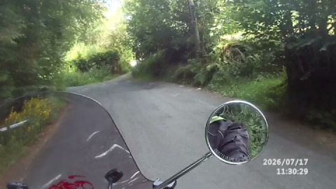Crossing a narrow bridge over the west dart, then climbing the steep, twisty hill to Hexworthy.