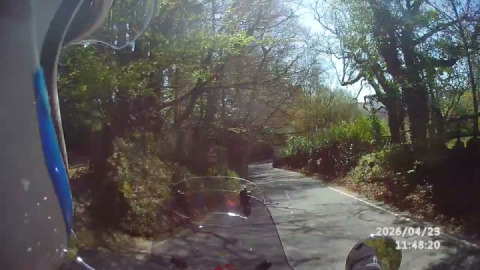 After the high moor, my interceptor descends the long winding hill, b4 crossing the Dartmeet bridge.