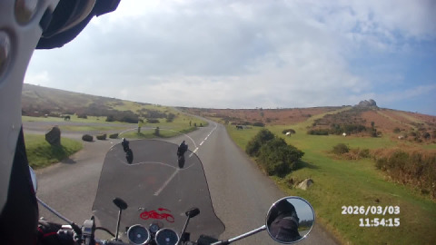 Climbing up onto Dartmoor and passing Haytor rocks.
