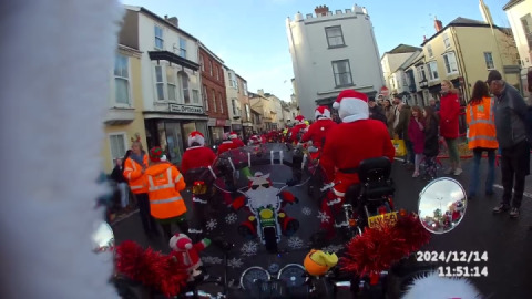 A warm welcome from South Molton as Santa's on a bike little bridge house pass through the town.