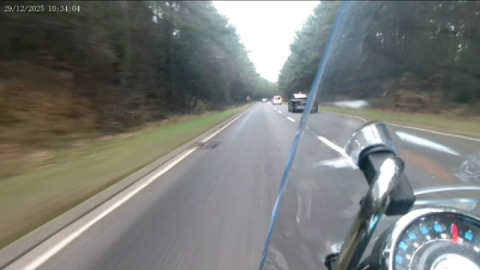 A royal enfield meteor 350 on a dual carriageway.