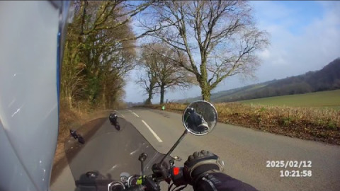 Cruising along the beautiful Teign valley road on a Royal Enfield Interceptor 650cc.