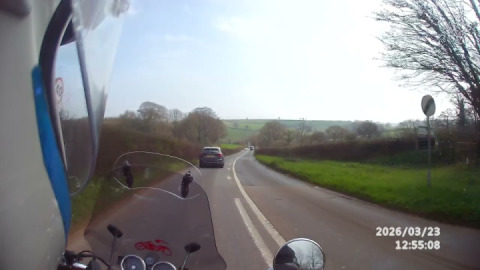 Cautiously passing a notoriously dangerous junction then closing up for a possible overtake.