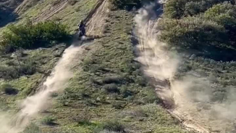 Having fun climbing the rutty hills