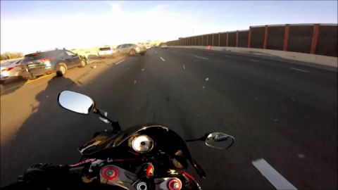 Motorcycle dodges wreck on freeway