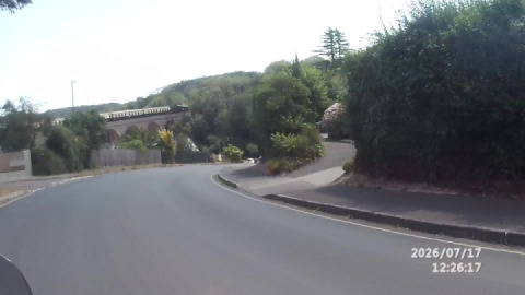 Steam train on the paignton to Kingswear line, crossing the Brunel viaduct.