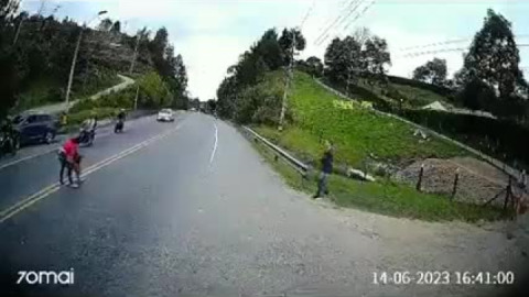 The motorcyclist accidentally ran over the child and saved her life. Impressive.