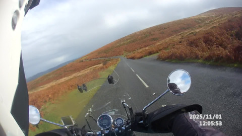 The beauty of a royal enfield meteor 350 on the open moor, ....