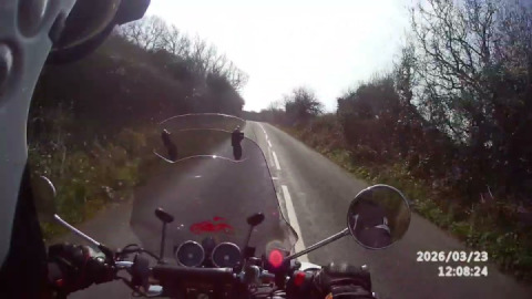Interceptor 650cc leaving Jennycliffe to head up the twisties and along the coast road.