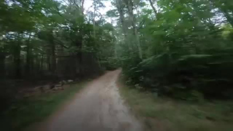 Border trail to covered bridge at sunset